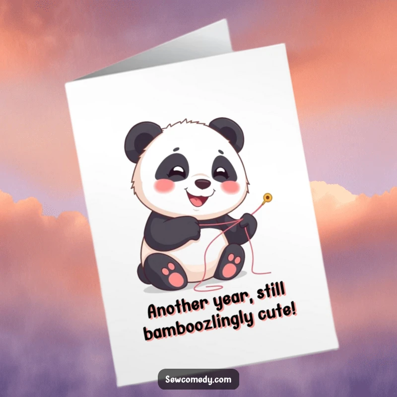 Free printable birthday card with a happy panda cub smiling, holding a needle and thread, ready to create.